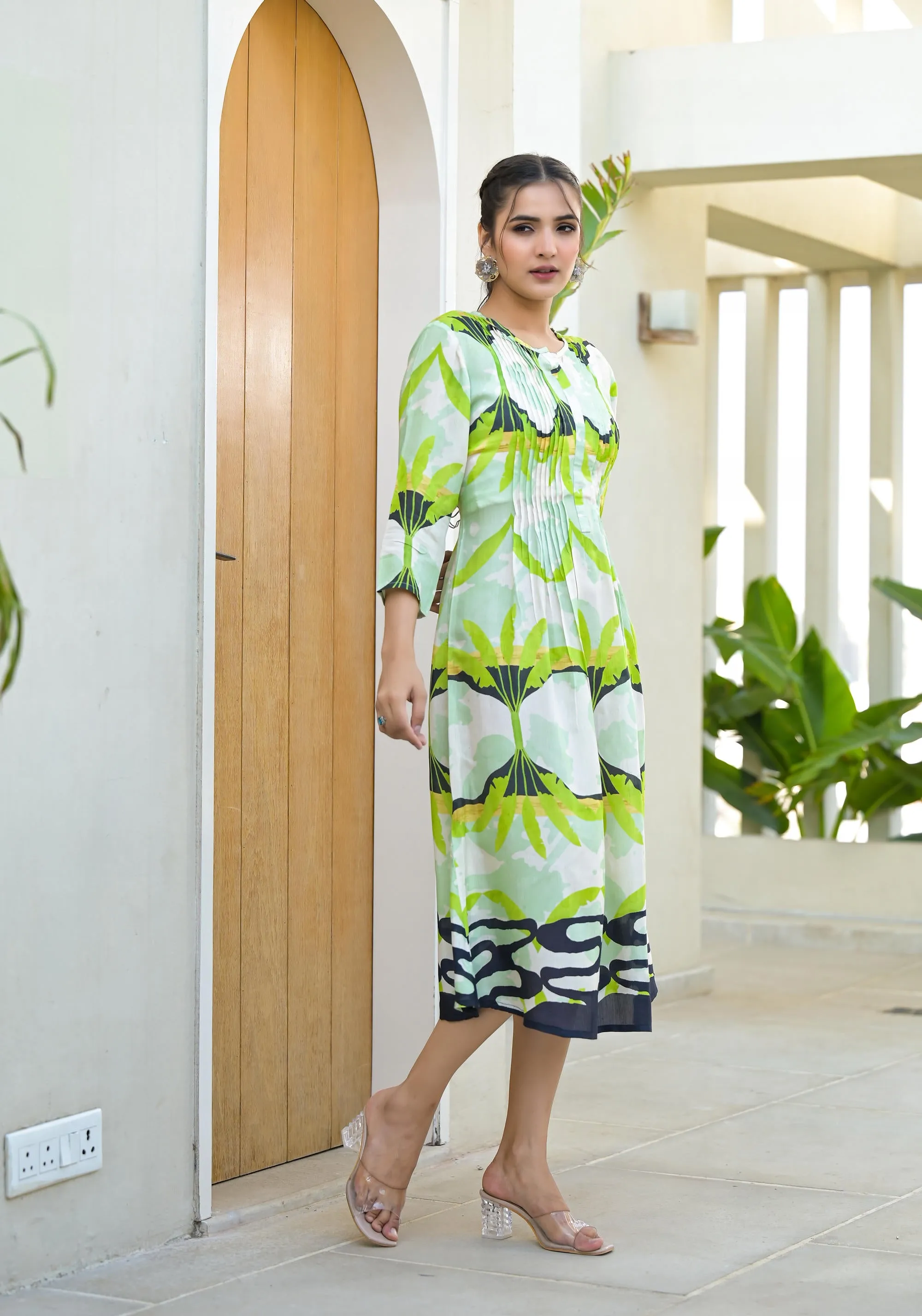 Green muslin boat neck knee length dress with ethnic print