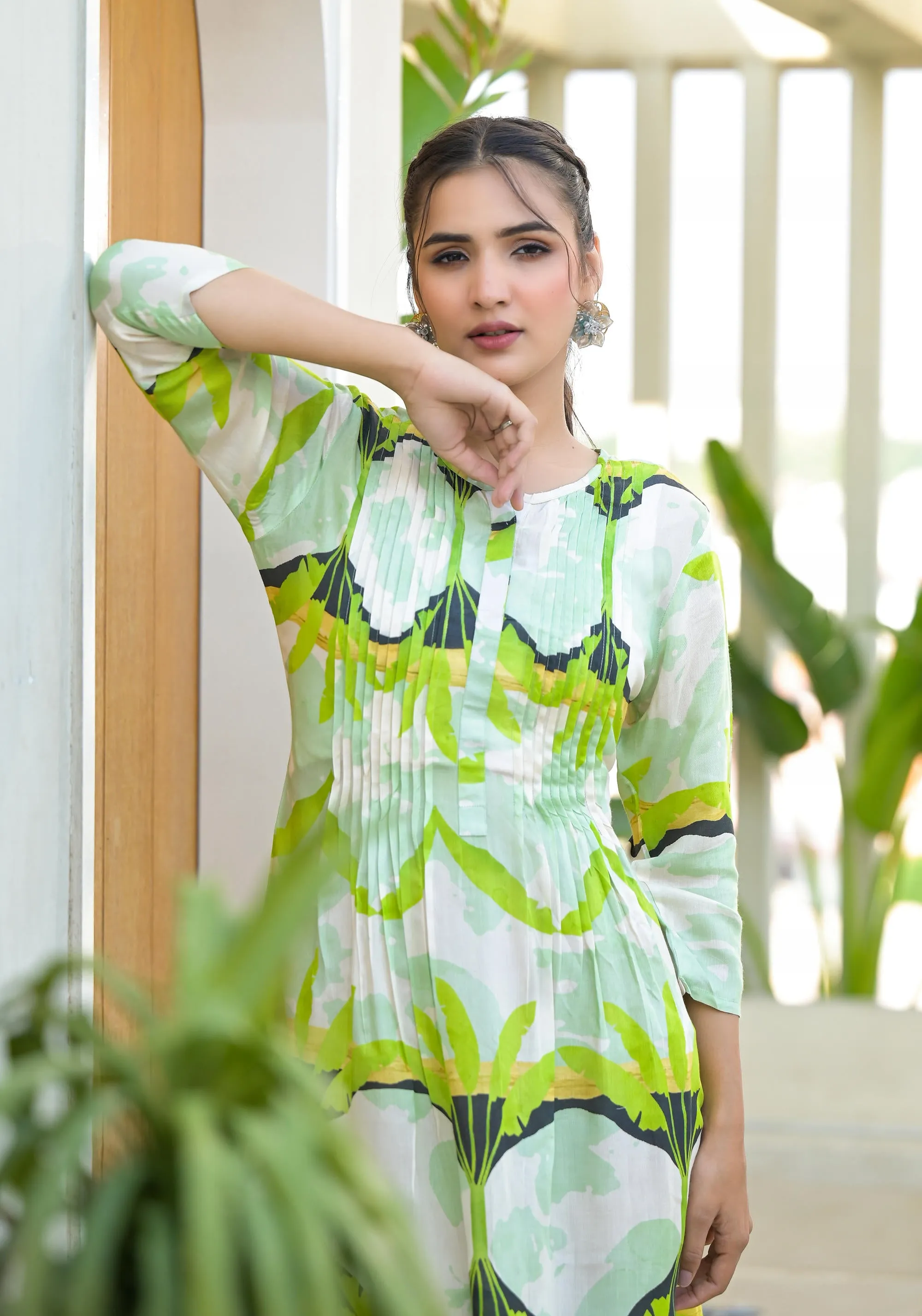 Green muslin boat neck knee length dress with ethnic print